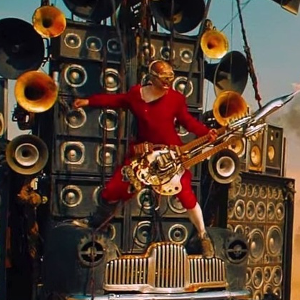 Mad Max Fury Road - The Story of the Blind Guitarist, the Doof Warrior! 